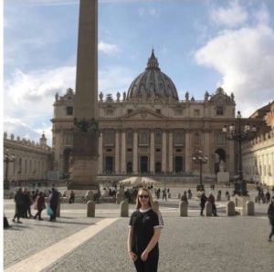 Samantha outside a cathedral